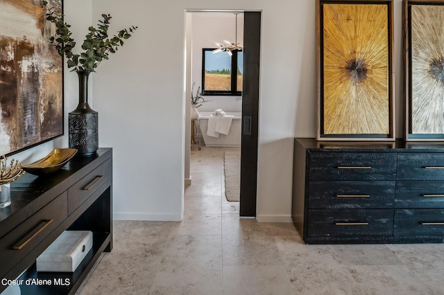 17056 S Lazurite Dr, Coeur Dalene, ID 83814 - bathroom featuring baseboards, a freestanding tub, and vanity