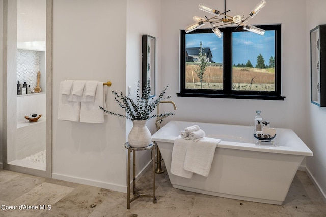 17056 S Lazurite Dr, Coeur Dalene, ID 83814 - full bath featuring an inviting chandelier, baseboards, and a soaking tub