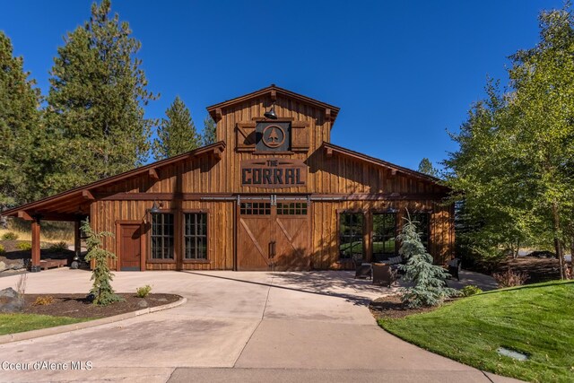 17056 S Lazurite Dr, Coeur Dalene, ID 83814 - exterior space featuring driveway and a garage