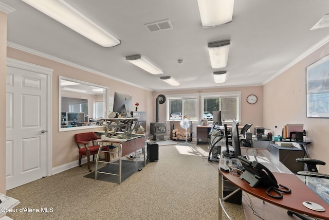 850 Hoop Loop, Priest River, ID 83856 - office space featuring ornamental molding, a wood stove, carpet floors, and baseboards