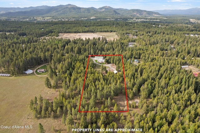 850 Hoop Loop, Priest River, ID 83856 - view of property location featuring a forest, mountains, and property boundaries highlighted