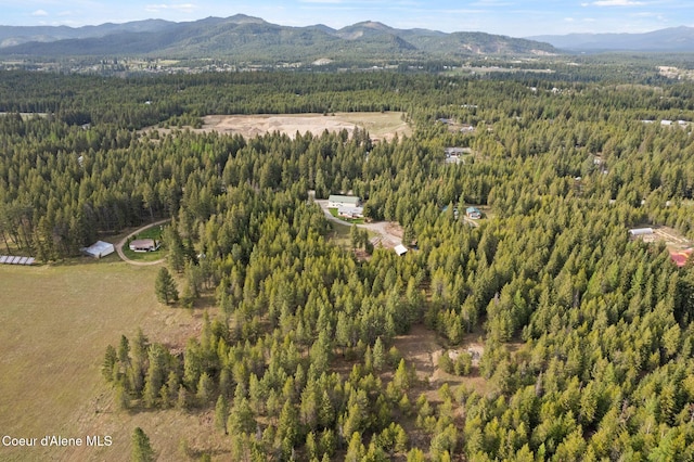 850 Hoop Loop, Priest River, ID 83856 - aerial view of property and surrounding area featuring a forest and a mountain backdrop