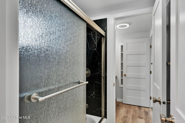 bathroom featuring wood finished floors