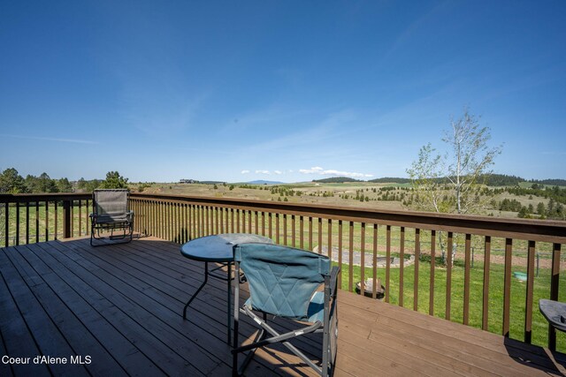 6035 W Conkling Rd, Worley, ID 83876 - wooden deck with a yard
