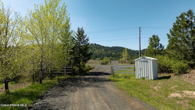 view of street featuring a view of trees
