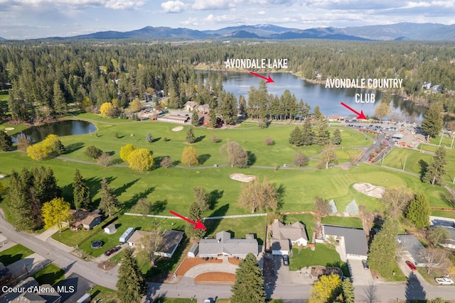 10792 N Magic Ct, Hayden, ID 83835 - aerial view of a water and mountain view, a forest, and a golf course