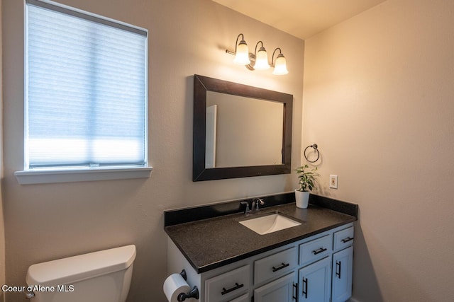 10792 N Magic Ct, Hayden, ID 83835 - bathroom with toilet and vanity
