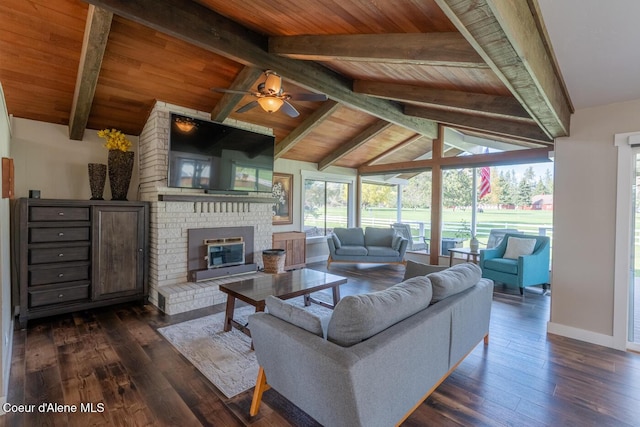 10792 N Magic Ct, Hayden, ID 83835 - living area featuring dark wood-style flooring, ceiling fan, wood ceiling, a fireplace, and baseboards