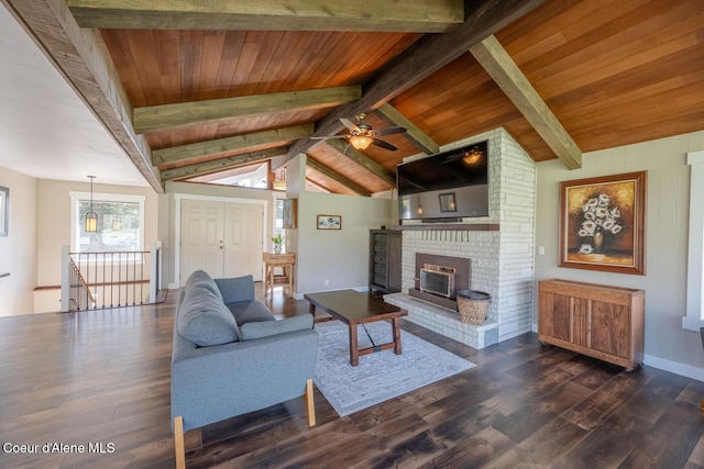 10792 N Magic Ct, Hayden, ID 83835 - living room featuring a brick fireplace, dark wood finished floors, baseboards, wood ceiling, and ceiling fan