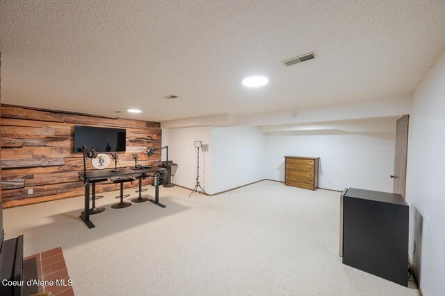 10792 N Magic Ct, Hayden, ID 83835 - carpeted home office featuring a textured ceiling, recessed lighting, and wood walls