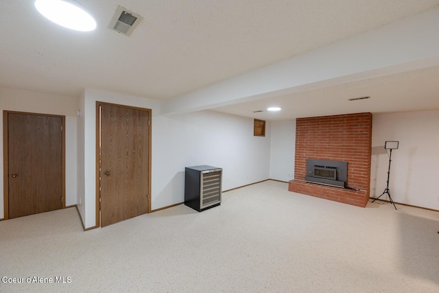 10792 N Magic Ct, Hayden, ID 83835 - finished basement with a brick fireplace and baseboards