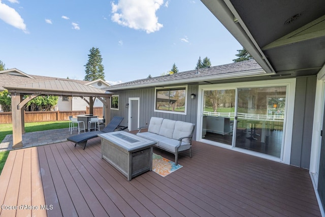 10792 N Magic Ct, Hayden, ID 83835 - wooden terrace with a gazebo, fence, outdoor lounge area, and outdoor dining area