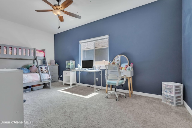 carpeted bedroom featuring a ceiling fan and baseboards