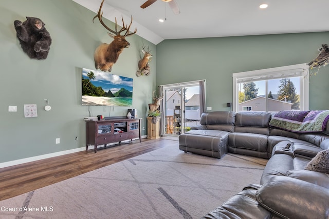 living room with baseboards, recessed lighting, ceiling fan, and wood finished floors
