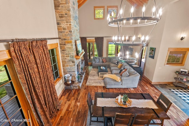 504 Hornby Pl, Dover, ID 83825 - living area with high vaulted ceiling, a chandelier, and plenty of natural light