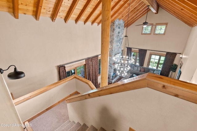 504 Hornby Pl, Dover, ID 83825 - stairway featuring wooden ceiling, beamed ceiling, ceiling fan, high vaulted ceiling, and a chandelier