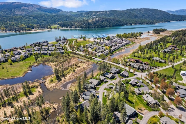 504 Hornby Pl, Dover, ID 83825 - aerial view of property and surrounding area with a water and mountain view, a forest, and nearby suburban area