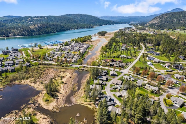 504 Hornby Pl, Dover, ID 83825 - aerial view of property's location with a water and mountain view, a heavily wooded area, and nearby suburban area