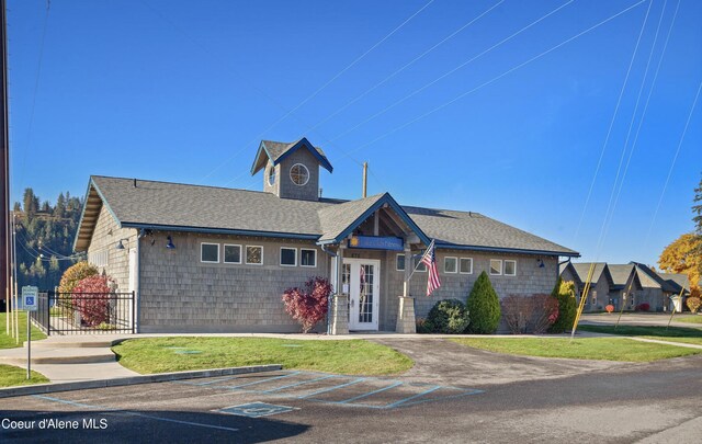 504 Hornby Pl, Dover, ID 83825 - view of front of property with a shingled roof and uncovered parking