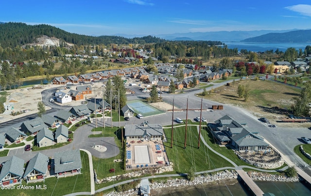 504 Hornby Pl, Dover, ID 83825 - aerial view of property and surrounding area featuring a heavily wooded area, a water and mountain view, and nearby suburban area