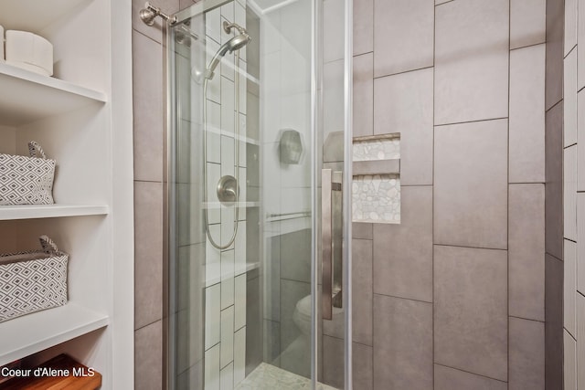 full bathroom featuring a shower stall