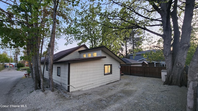 view of side of property with fence
