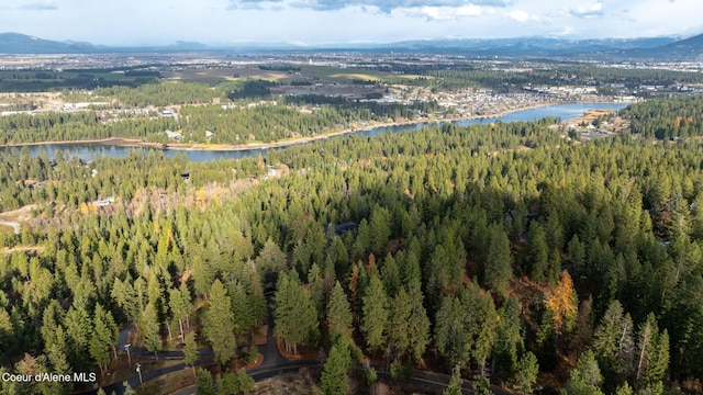 5969 W Highland Dr, Coeur Dalene, ID 83814 - bird's eye view with a water and mountain view and a view of trees
