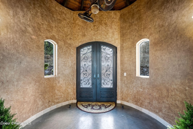 5969 W Highland Dr, Coeur Dalene, ID 83814 - entrance to property featuring stucco siding and french doors