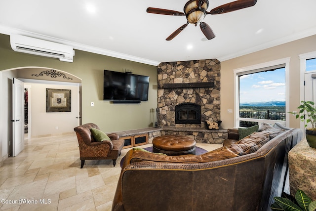 5969 W Highland Dr, Coeur Dalene, ID 83814 - living area with ceiling fan, a wall unit AC, crown molding, a fireplace, and stone tile flooring