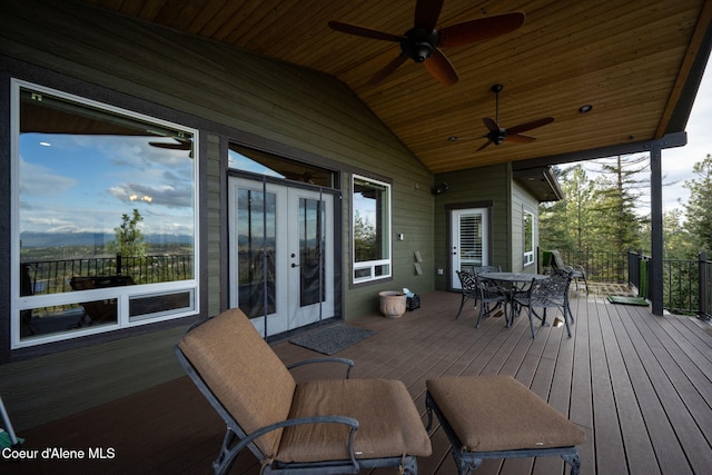 5969 W Highland Dr, Coeur Dalene, ID 83814 - deck with ceiling fan, french doors, and outdoor dining area
