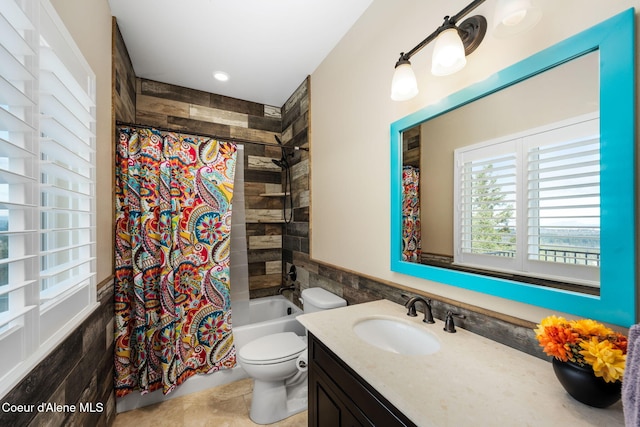 5969 W Highland Dr, Coeur Dalene, ID 83814 - full bath featuring tile walls, tile patterned flooring, vanity, toilet, and shower / tub combo with curtain