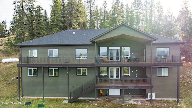 5969 W Highland Dr, Coeur Dalene, ID 83814 - back of house with a shingled roof, a deck, a balcony, french doors, and a ceiling fan