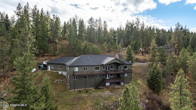 5969 W Highland Dr, Coeur Dalene, ID 83814 - drone / aerial view featuring a view of trees
