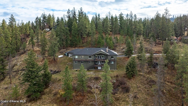 5969 W Highland Dr, Coeur Dalene, ID 83814 - birds eye view of property with a view of trees