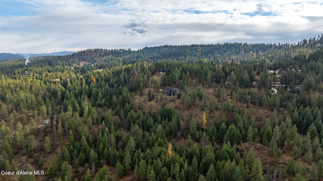 5969 W Highland Dr, Coeur Dalene, ID 83814 - aerial view featuring a mountain view and a wooded view