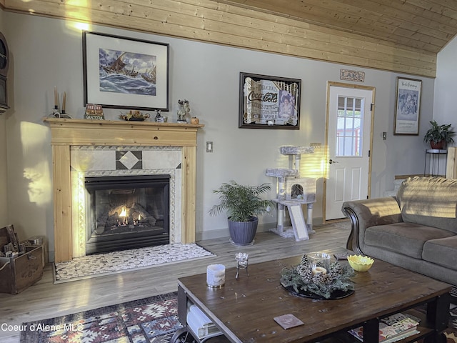 314 Overlake View Rd, Cocolalla, ID 83813 - living room featuring a premium fireplace, vaulted ceiling, wood finished floors, and wood ceiling