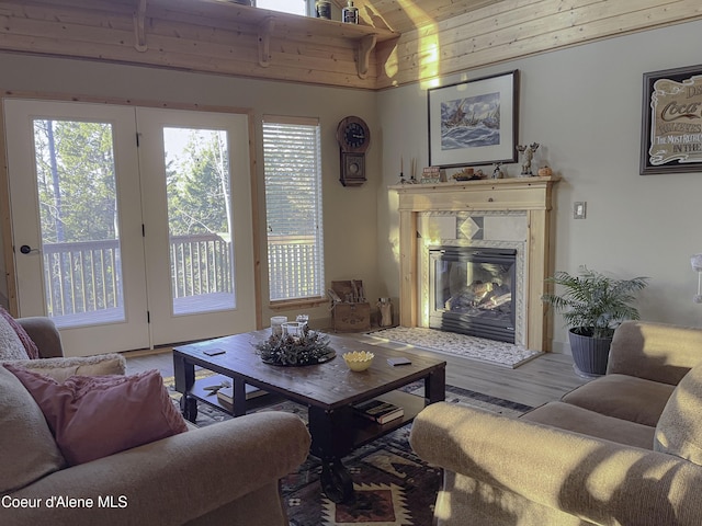 314 Overlake View Rd, Cocolalla, ID 83813 - living area with wooden ceiling, vaulted ceiling, wood finished floors, and a premium fireplace