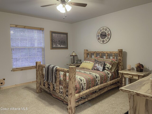 314 Overlake View Rd, Cocolalla, ID 83813 - carpeted bedroom featuring baseboards and a ceiling fan
