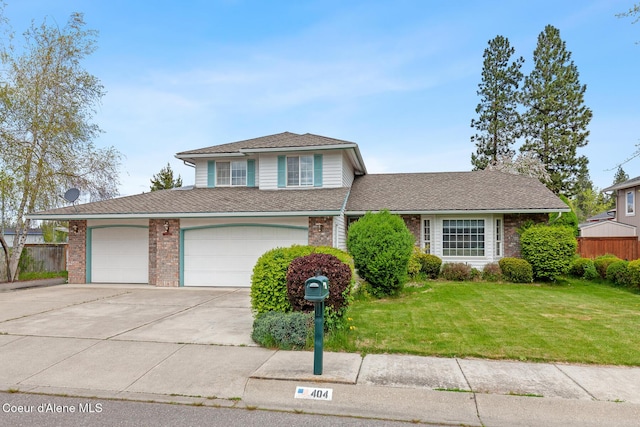 404 W 18th Ave, Post Falls, ID 83854 - traditional-style house featuring brick siding, driveway, fence, and a front yard