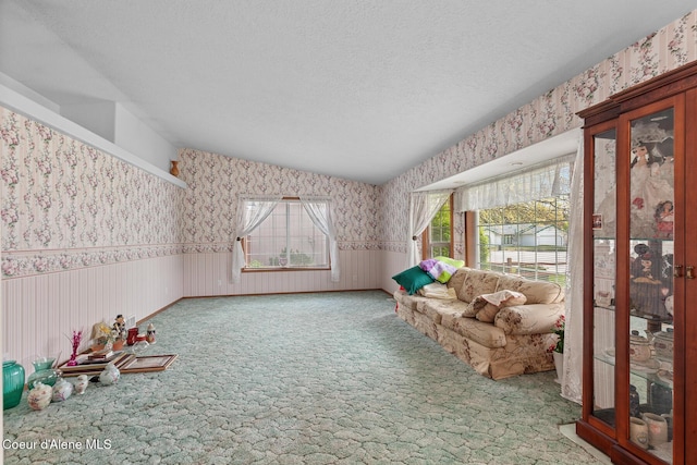 404 W 18th Ave, Post Falls, ID 83854 - game room featuring wainscoting, a textured ceiling, carpet, and wallpapered walls