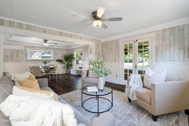 723 Forest Ave, Sandpoint, ID 83864 - living room featuring ceiling fan, wood finished floors, healthy amount of natural light, wainscoting, and crown molding