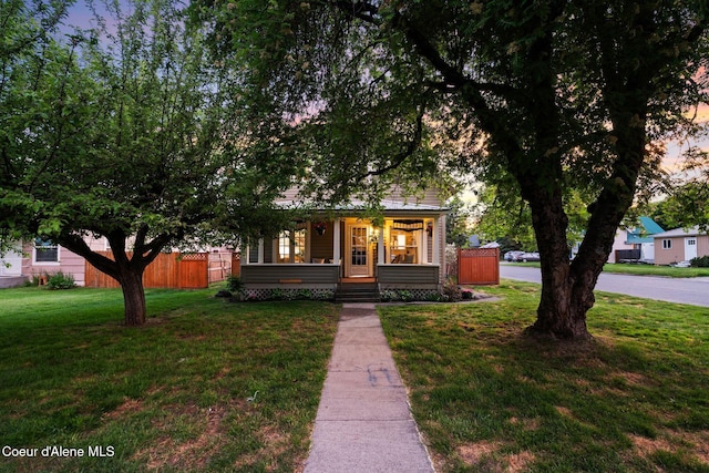 723 Forest Ave, Sandpoint, ID 83864 - view of property hidden behind natural elements with a porch