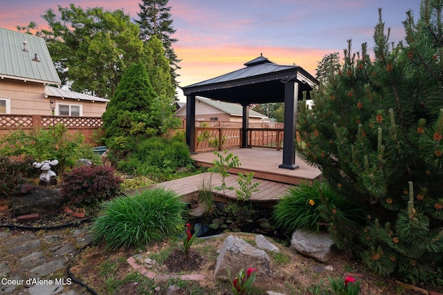 723 Forest Ave, Sandpoint, ID 83864 - yard at dusk featuring a gazebo and a deck