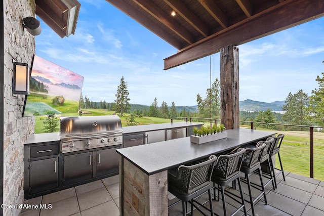 6869 S Gozzer Rd Unit C201, Harrison, ID 83833 - view of patio / terrace featuring a mountain view