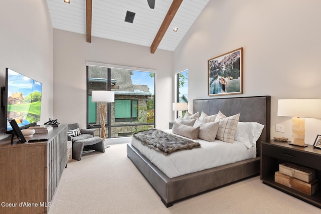 6869 S Gozzer Rd Unit C201, Harrison, ID 83833 - bedroom with carpet flooring, wood ceiling with exposed beams, and high vaulted ceiling