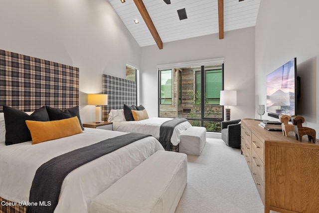 6869 S Gozzer Rd Unit C201, Harrison, ID 83833 - bedroom featuring carpet, wood ceiling with exposed beams, access to outside, and high vaulted ceiling