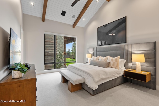 6869 S Gozzer Rd Unit C201, Harrison, ID 83833 - carpeted bedroom featuring wood ceiling with exposed beams, high vaulted ceiling, and ceiling fan