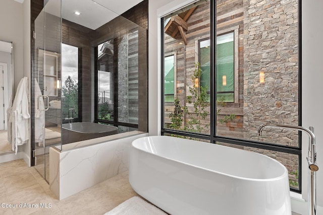 6869 S Gozzer Rd Unit C201, Harrison, ID 83833 - full bath featuring a freestanding bath and a stall shower