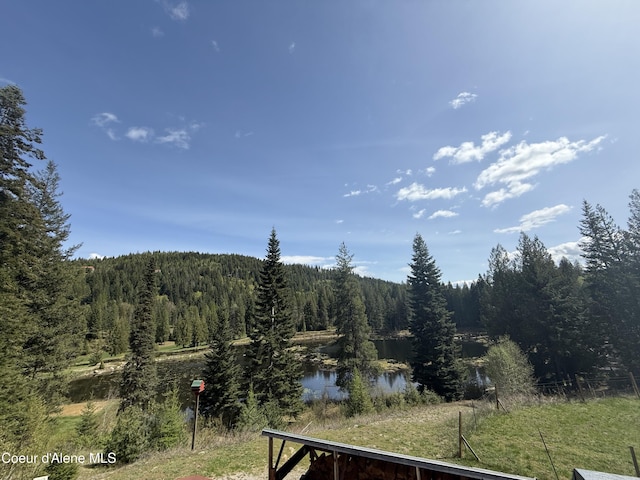 1959 Thimbleberry Ln, Sandpoint, ID 83864 - view of water feature featuring a forest view
