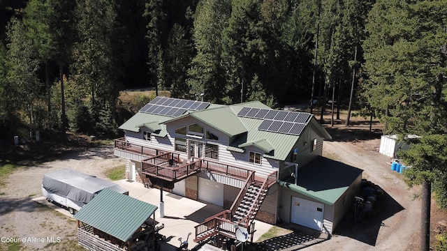 1959 Thimbleberry Ln, Sandpoint, ID 83864 - drone / aerial view featuring a wooded view